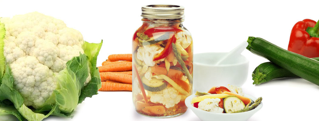 mixed pickled vegetables in a glass jar