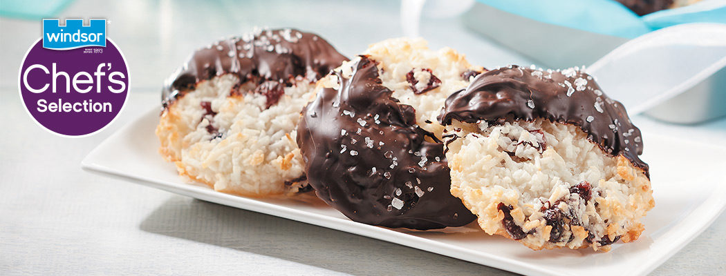 salted chocolate dipped cranberry macaroons in a plate
